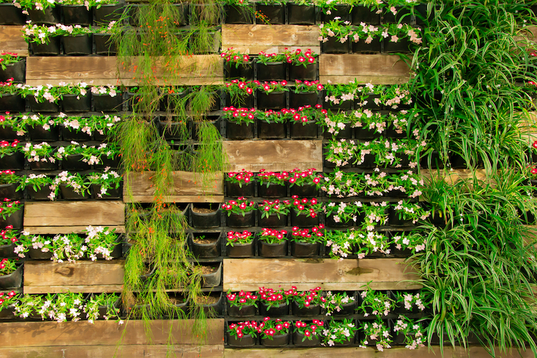 modular vertical gadening with potted flowers